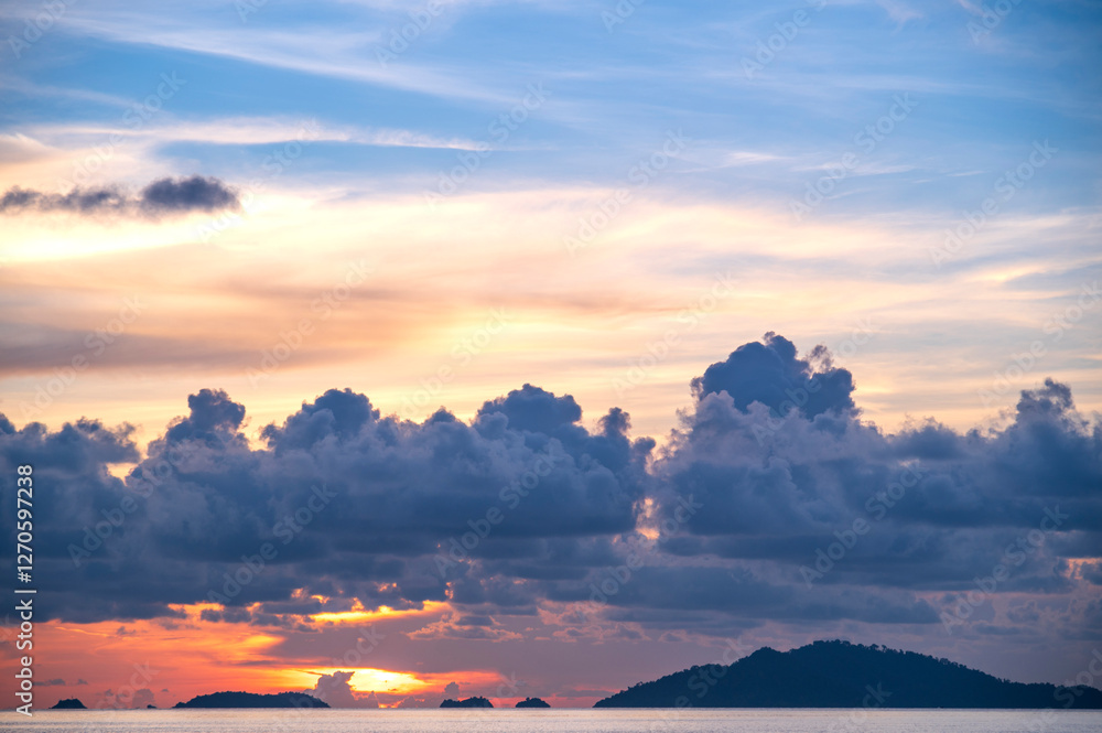 sunset or sunrise seascape on koh Lipe isaland with gold lighting sunset sky background