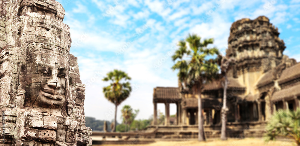 Horizontal banner with stone face in Prasat Bayon Temple. Famous landmark Angkor Wat complex, khmer culture, Siem Reap, Cambodia. Topic of vacation, travel, trip abroad on vacation, cruises and tours Horizontal banner with stone face in Prasat Bayon Temple. Famous landmark Angkor Wat complex, khmer culture, Siem Reap, Cambodia. Topic of vacation, travel, trip abroad on vacation, cruises and tours