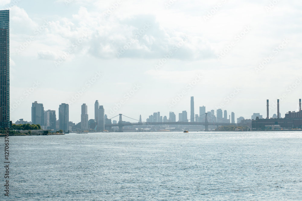 View of New York City skyline across the river during early autu View of New York City skyline across the river during early autu