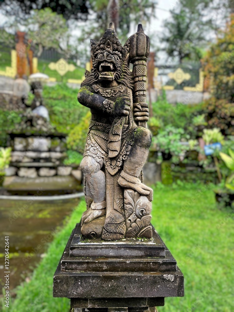 Traditional stone guardian statue from Bali, showcasing cultural heritage and artistic craftsmanship on Balinese Temple Traditional stone guardian statue from Bali, showcasing cultural heritage and artistic craftsmanship on Balinese Temple
