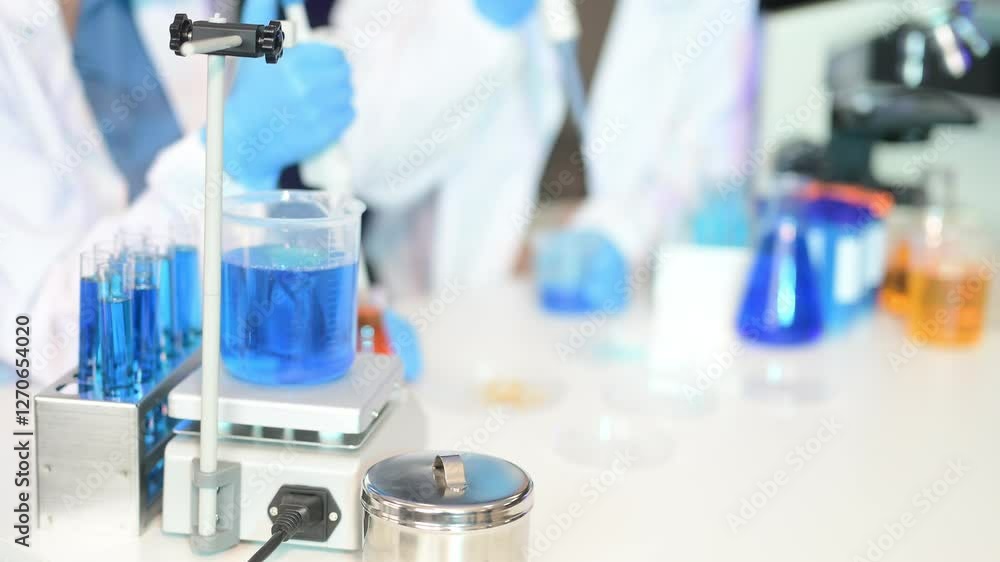 Scientist team meeting and writing analysis results in the laboratory study