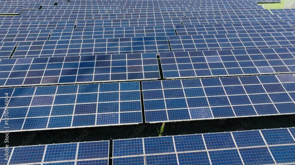 Solar panels at solar power plant for electricity generation, Solar farm, photovoltaic power station, Aerial closeup Solar panels at solar power plant for electricity generation, Solar farm, photovoltaic power station, Aerial closeup