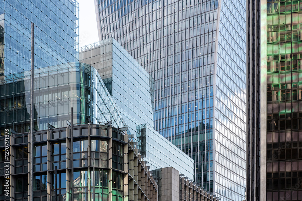 Urban perspective of contemporary office buildings in The City, London, emphasizing business growth, innovation, and global financial influence. Urban perspective of contemporary office buildings in The City, London, emphasizing business growth, innovation, and global financial influence.