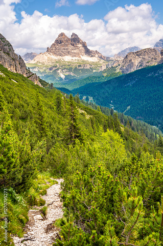 Scenic view of the Drei Zinnen in Misurina, Venetien, Italy with a forest path photo