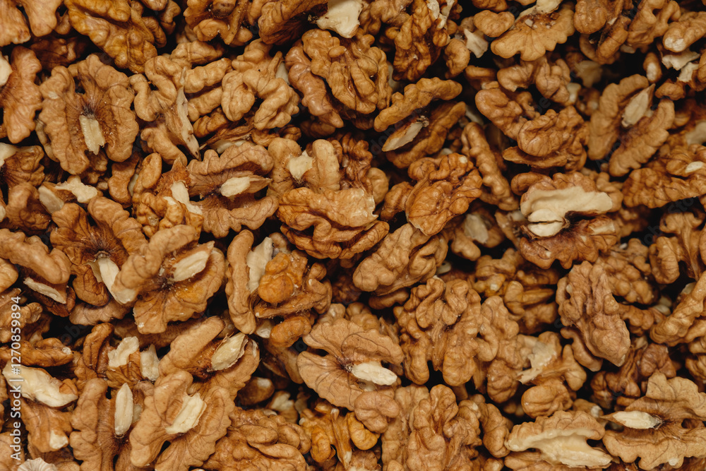Nutty abundance showcases the rich texture and earthy tones of shelled walnuts ready for culinary delights and healthy snacking Nutty abundance showcases the rich texture and earthy tones of shelled walnuts ready for culinary delights and healthy snacking