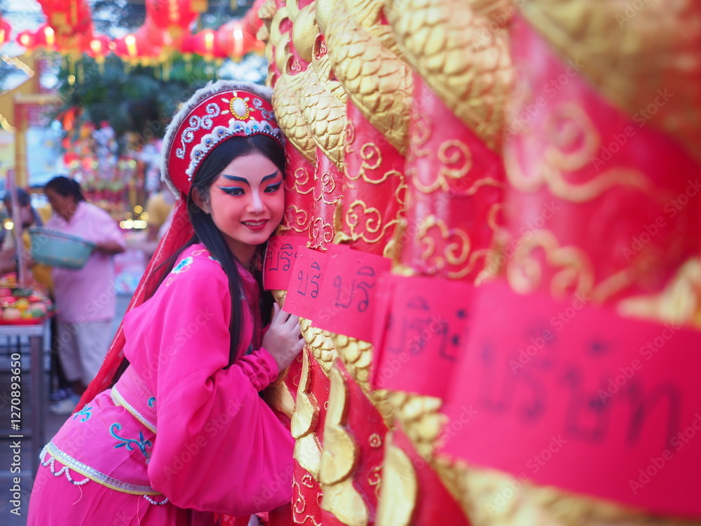 Beautiful young woman with Chinese Opera dress in Chiang Mai, Thailand.