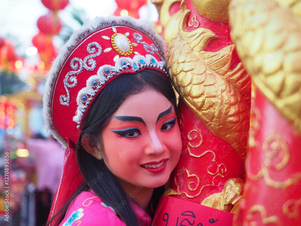Beautiful young woman with Chinese Opera dress in Chiang Mai, Thailand.