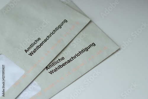 12. February 2025 - Hamburg, Germany. Close up of two voting notification letters for election day  photo