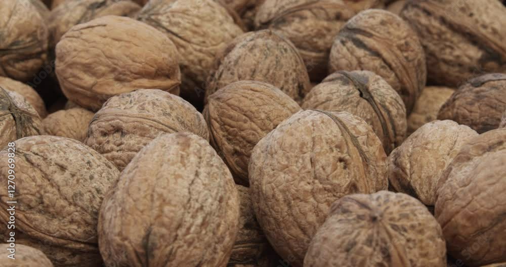 fresh walnuts closeup rotating selective focus 4k 30fps fresh walnuts closeup rotating selective focus 4k 30fps