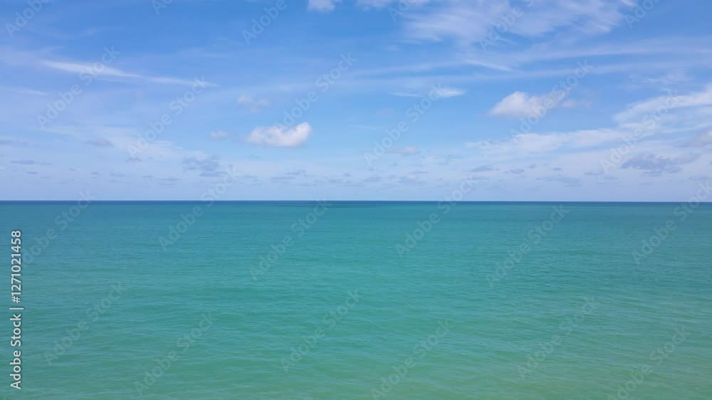 peaceful beach scene with gentle waves and a clear sky.. peaceful beach scene with gentle waves and a clear sky..