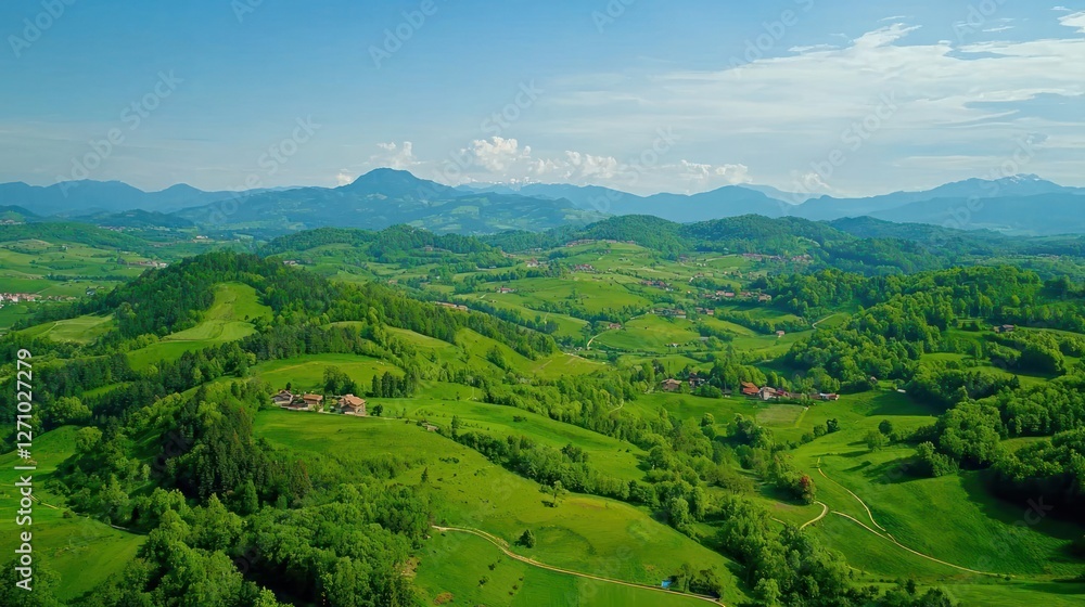 Aerial View of Lush Green Hills and Mountains on a Sunny Day Aerial View of Lush Green Hills and Mountains on a Sunny Day