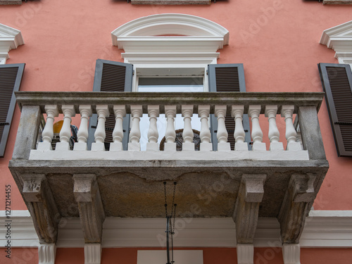 Classic European balcony with stone balustrades photo