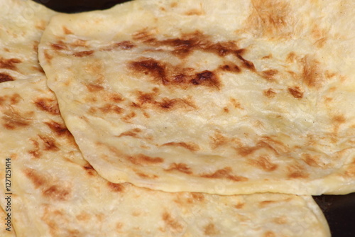 A close-up of the traditional Moroccan flatbread known as Msemmen or Msemen photo