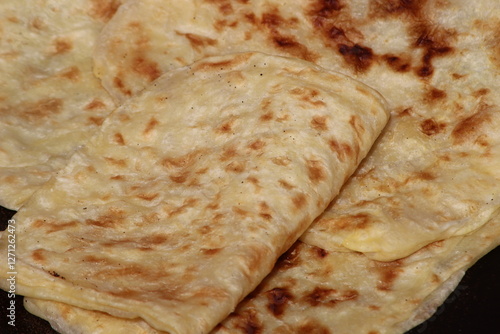 A close-up of the traditional Moroccan flatbread known as Msemmen or Msemen photo