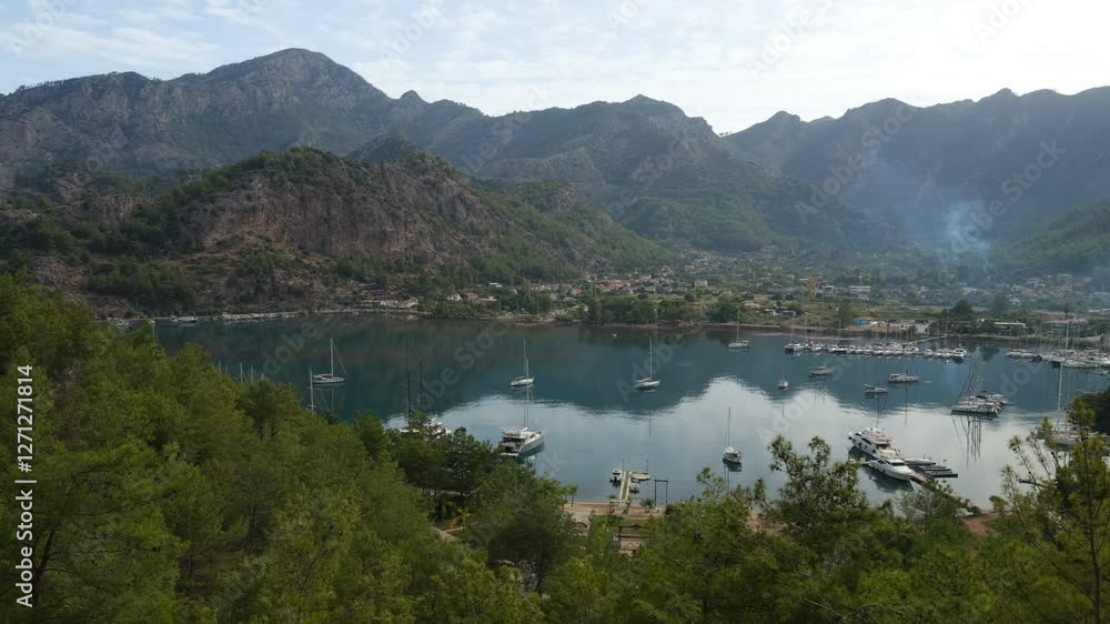 Morning view in Kizkumu Bay. Orhaniye village Mediterranean coast of Bozburun peninsula. Marmaris district, Mugla province, Turkey - 4K video Morning view in Kizkumu Bay. Orhaniye village Mediterranean coast of Bozburun peninsula. Marmaris district, Mugla province, Turkey - 4K video