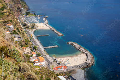 Calheta Sandy Beach, first artificial beach in Madeira, Portugal, made of golden sand imported from Morocco
