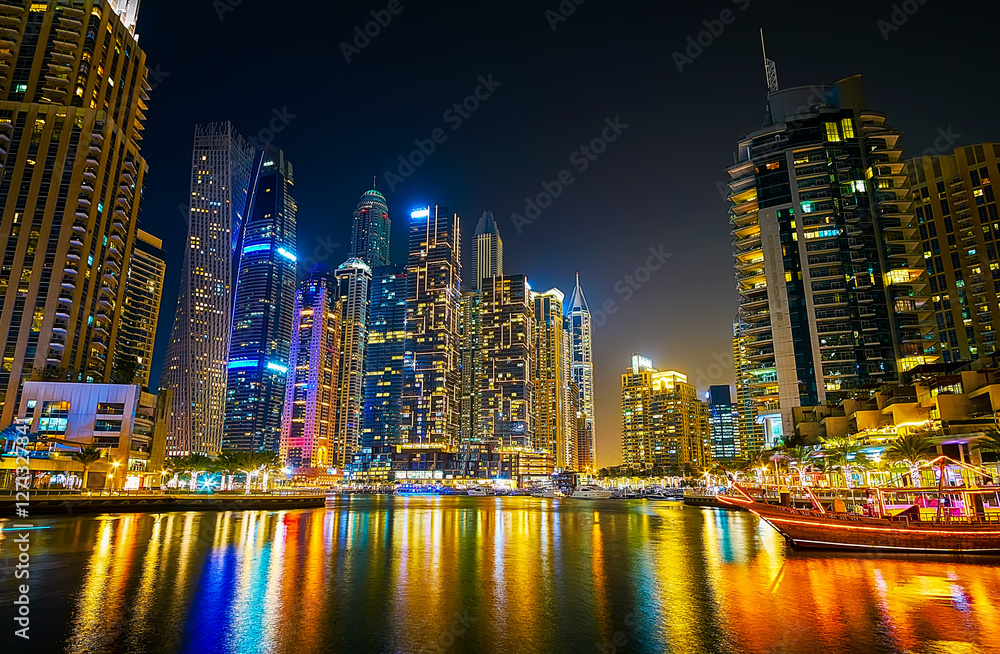 Colorful reflection on waters of Dubai Marina, UAE