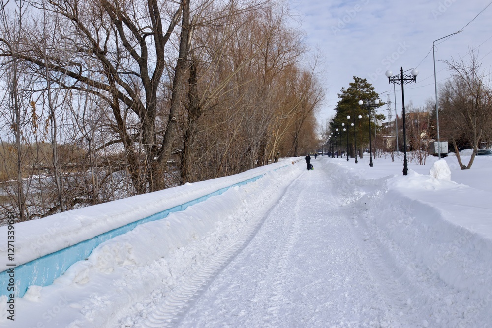 snowdrifts on the embankment of the Irtysh River in Ust Kamenogorsk, East Kazakhstan in winter