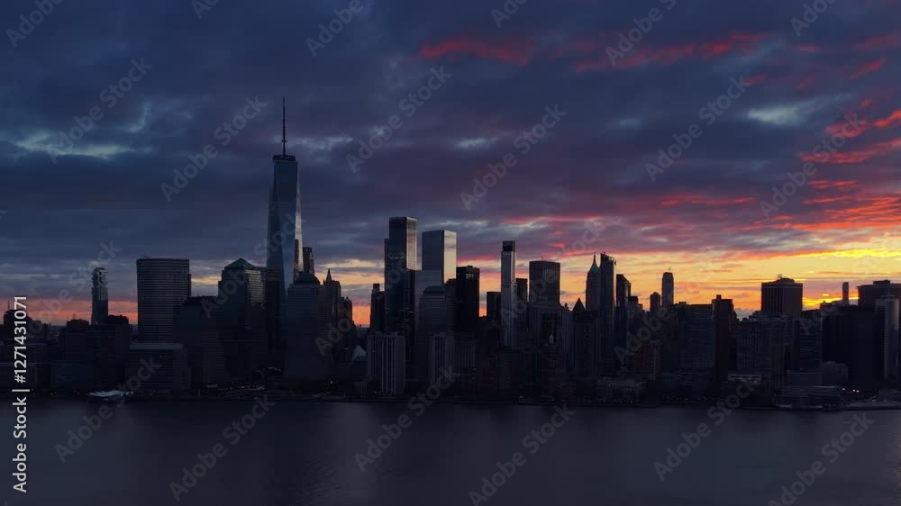 Aerial view of sunrise and Lower Manhattan skyline. New York City World Trade Center skyscrapers, Battery Park and the Hudson River Aerial view of sunrise and Lower Manhattan skyline. New York City World Trade Center skyscrapers, Battery Park and the Hudson River
