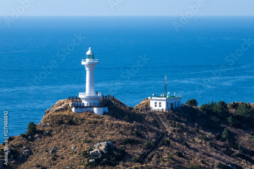 high-angle view of the lighthouse on the island photo