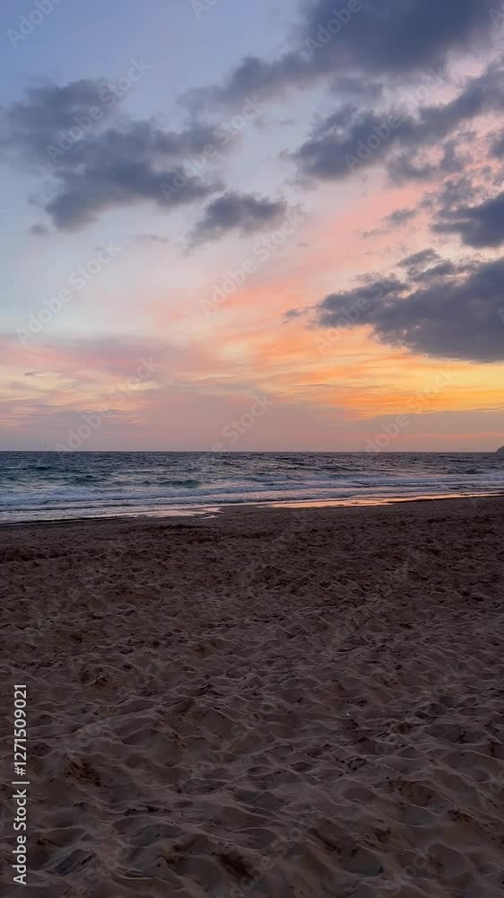 Soft Sunset Over a Tranquil Beach – Gentle Waves and Pastel Sky Soft Sunset Over a Tranquil Beach – Gentle Waves and Pastel Sky