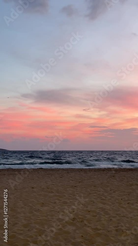 Breathtaking Ocean Sunset with Pink Sky and Gentle Waves