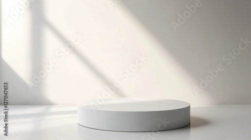 A simple white pedestal with ample copy space around it, ideal for product photography or minimalist design.