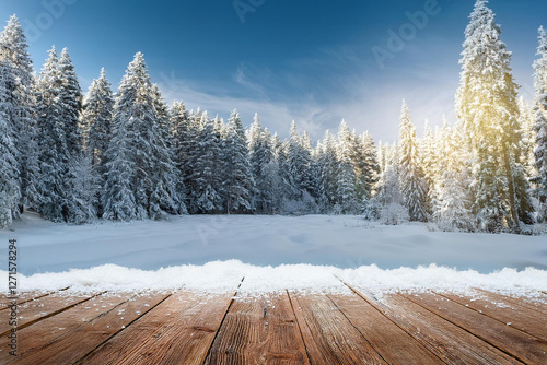 Wallpaper Mural Wooden floor with copy space or plank in Frozen winter forest covered snow in sunshine. Sun shining through snow covered trees, snowy mountain valley, winter seasonal landscape, beautiful nature Torontodigital.ca