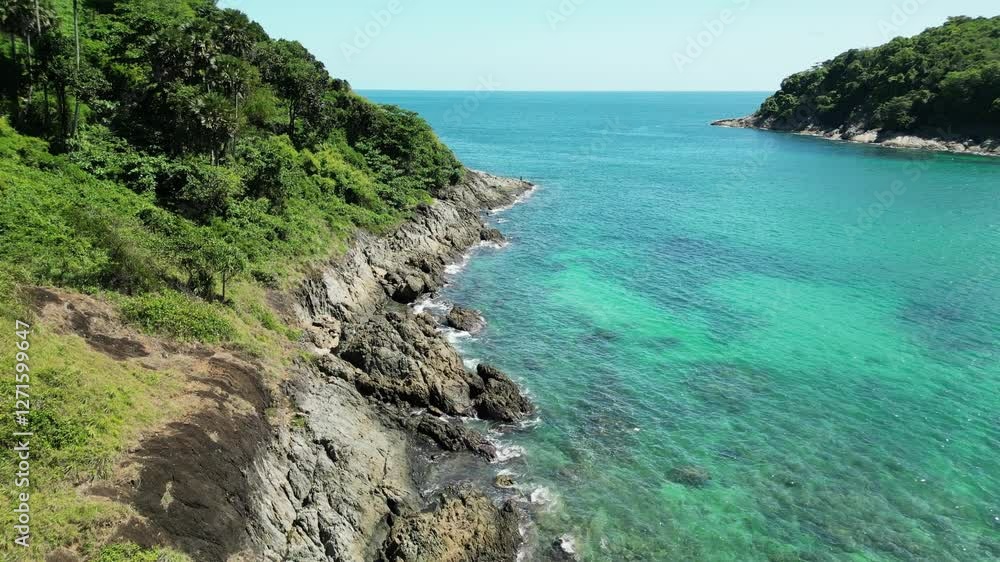 Sea bay with a rocky coast and turquoise water with holes in the sea. Drone video. Part 1 Sea bay with a rocky coast and turquoise water with holes in the sea. Drone video. Part 1