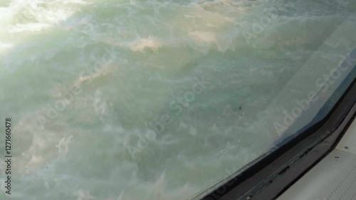 sea waves viewed from a ferry window