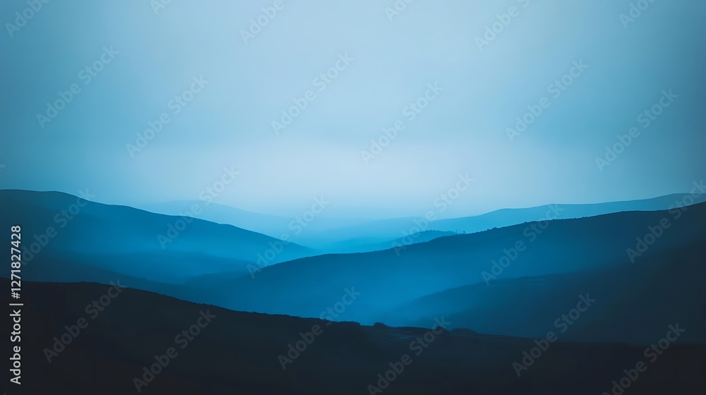 Serene Blue Mountainscape Under a Pale Sky Serene Blue Mountainscape Under a Pale Sky