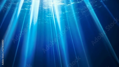 Sunbeams filtering through ocean water