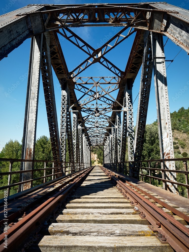 Rustic metal railway bridge with wooden tracks. Rustic metal railway bridge with wooden tracks.