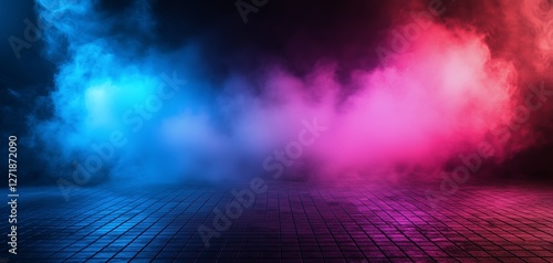 Colorful smoke fills an empty stage with blue and pink hues at night