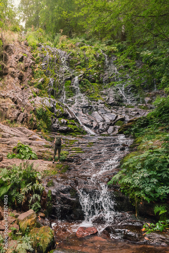 Obraz na płótnie Woman Tourist Enjoying Mountain Waterfall in Forest w salonie