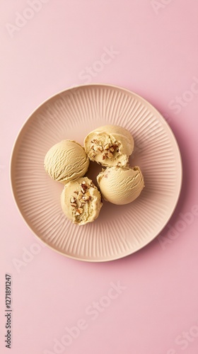Delicate Pistachio Ice Cream Scoops with Almonds on a Pastel Plate