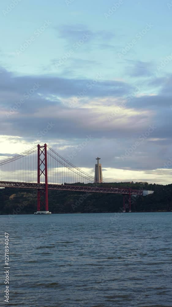 View of downtown Lisbon, on the riverfront, with the bridge traffic in the background View of downtown Lisbon, on the riverfront, with the bridge traffic in the background