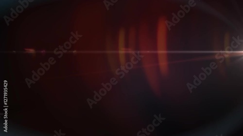 Warm light lens flare transitioning smoothly on dark background