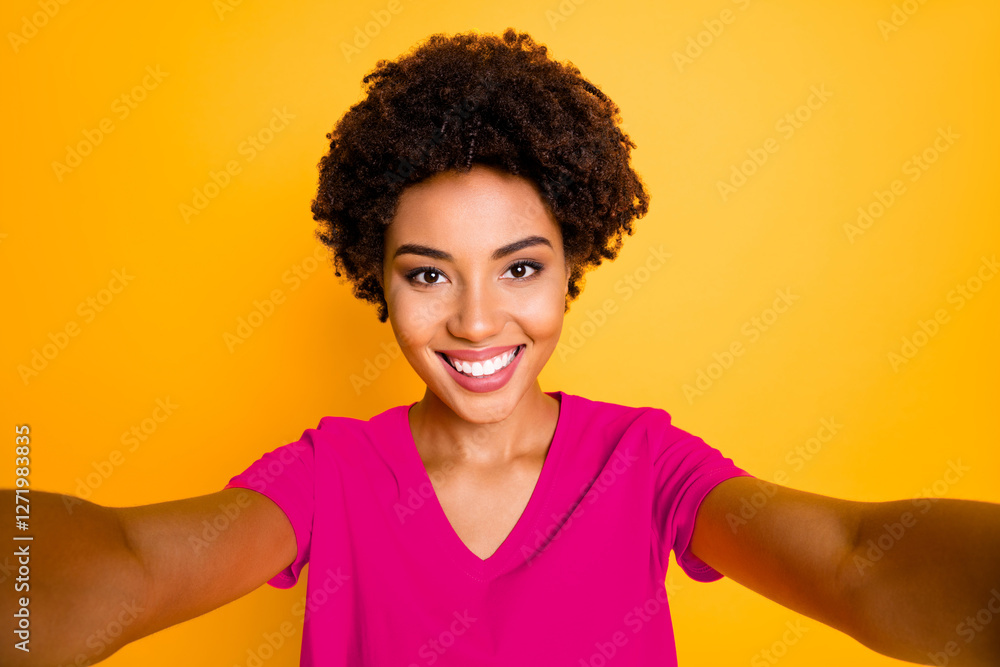 Photo of charming cute cheerful sweet nice girlfriend taking selfie recording video influencing her audiences while isolated over yellow bright color background Photo of charming cute cheerful sweet nice girlfriend taking selfie recording video influencing her audiences while isolated over yellow bright color background