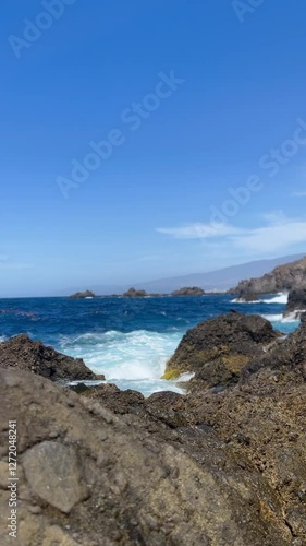 Majestic Ocean Waves Crashing on Volcanic Shores of Tenerife