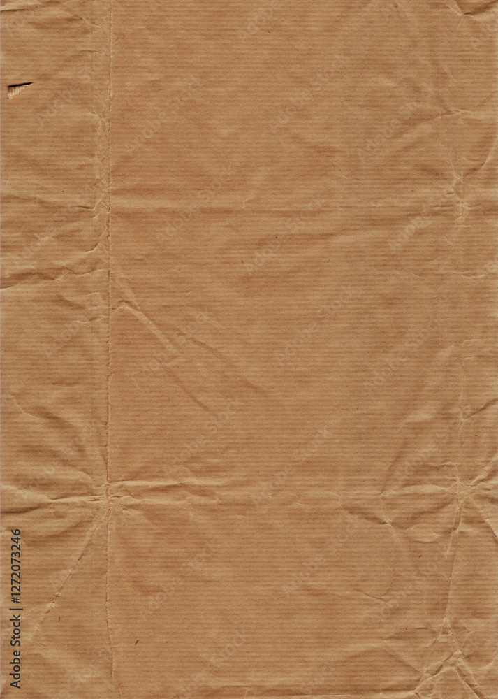 Fototapeta premium Slightly crumpled brown paper