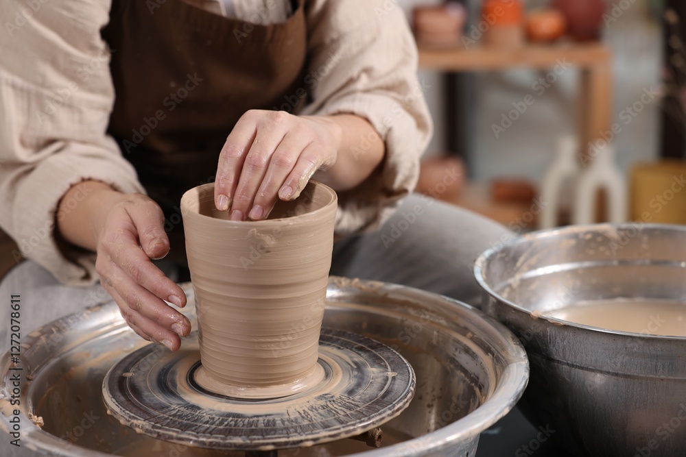 Hobby and craft. Woman making pottery indoors, closeup Hobby and craft. Woman making pottery indoors, closeup