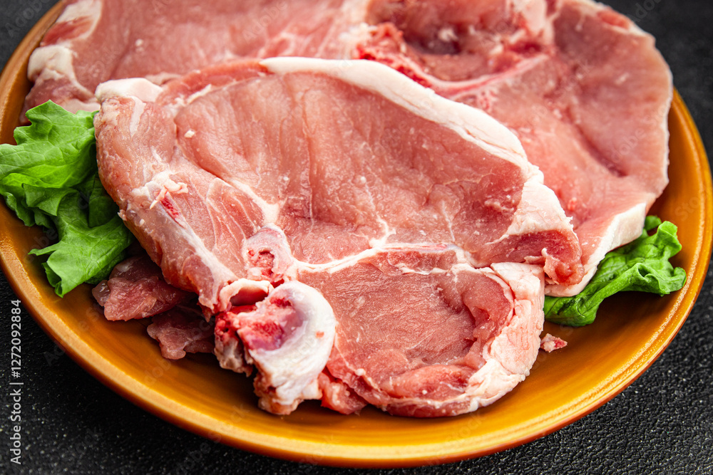Raw pork on bones meat fresh tasty food dish delicious gourmet food background on the table rustic food top view copy space Raw pork on bones meat fresh tasty food dish delicious gourmet food background on the table rustic food top view copy space