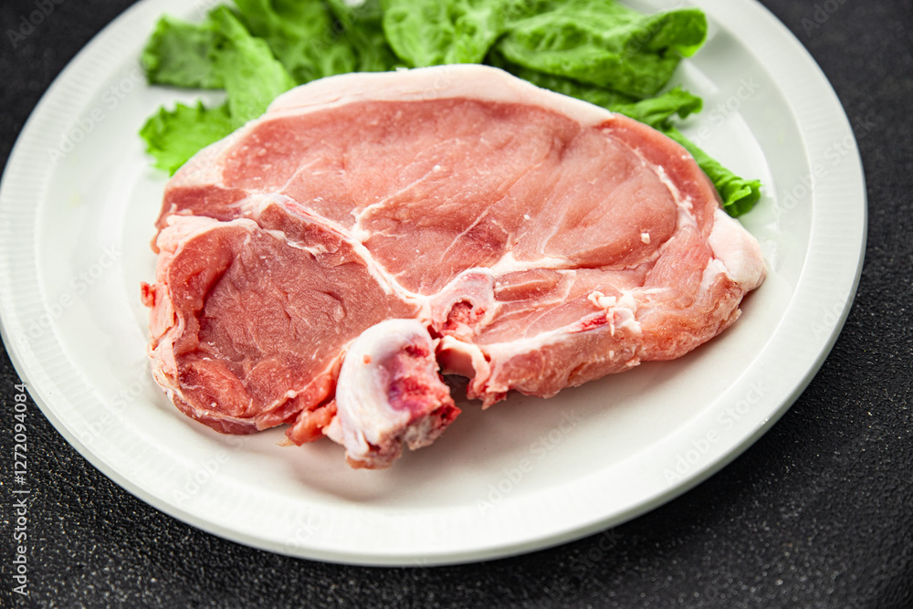 Raw pork on bones meat fresh tasty food dish delicious gourmet food background on the table rustic food top view copy space Raw pork on bones meat fresh tasty food dish delicious gourmet food background on the table rustic food top view copy space