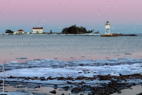 US Coast Guard Station North Superior is located in Grand Marais Minnesota on Lake Superior's Artist Point arm in blue hour at dusk photo