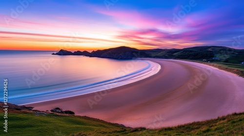 Wallpaper Mural A breathtaking view of a serene beach at sunset, showcasing vibrant colors in the sky with gentle waves lapping the shore Torontodigital.ca