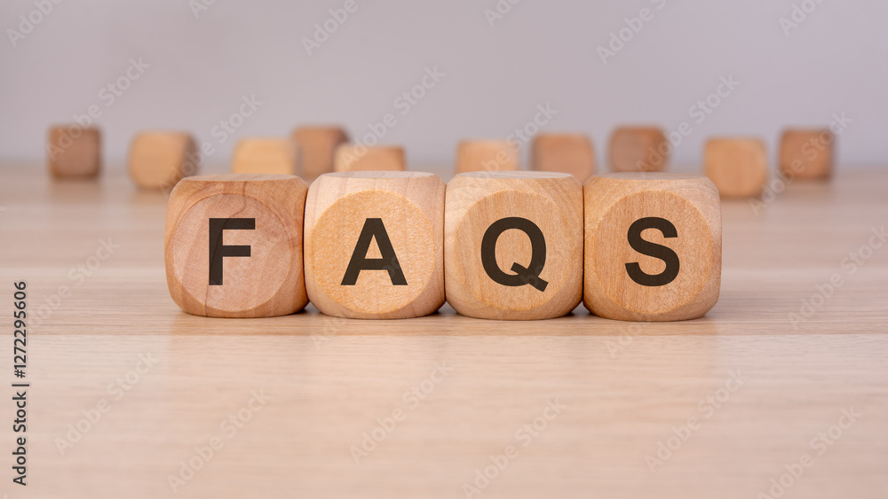 wooden blocks spelling 'FAQS' representing frequently asked questions, customer support, and help topics wooden blocks spelling 'FAQS' representing frequently asked questions, customer support, and help topics