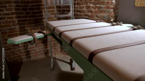 Lethal injection concept. Panoramic over the bed for prisoners