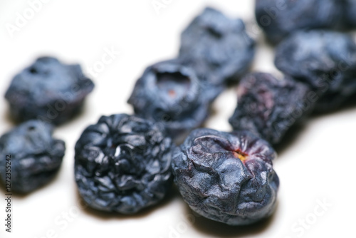 Photos wrinkled and shriveled blueberry in the fridge