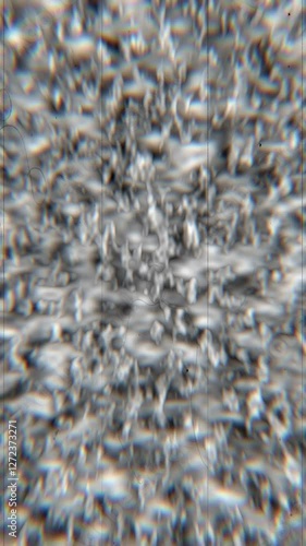 Abstract monochrome motion texture with a distorted organic pattern. Hypnotic fractal-like surface with a chaotic, glitchy effect, ideal for digital artists and sci-fi visuals